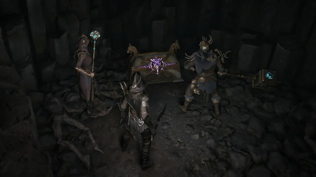 Mistfall Hunter squad inspecting loot in a dark cavern